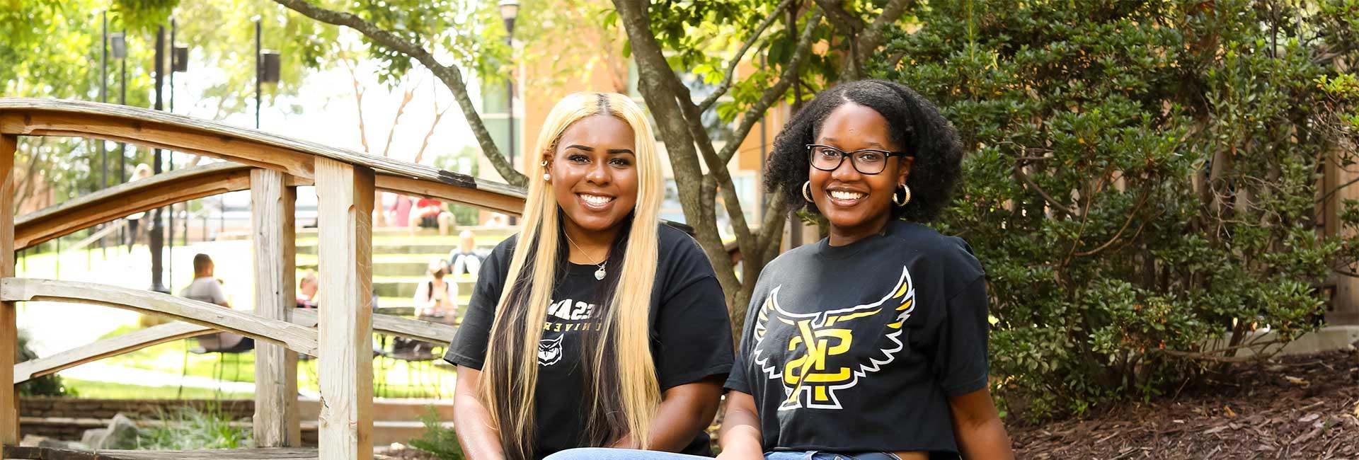 Leadership students sitting near legacy gazebo.